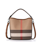 The classic women's one shoulder crossbody bag is a large capacity portable checkered bag made of high-quality canvas and cowhid