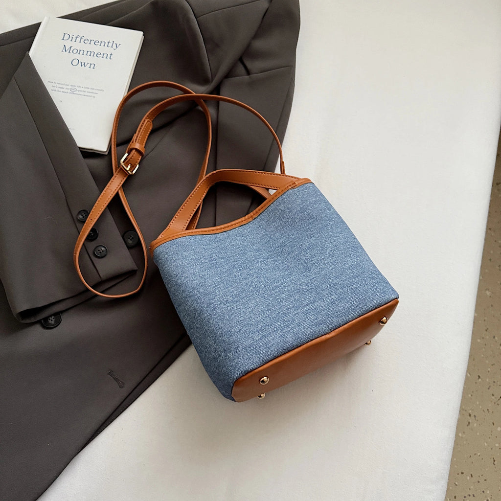 Women handbags. Early autumn senior commuter niche mobile phone slung bag girl 2025 new retro brown bucket bag small handbag