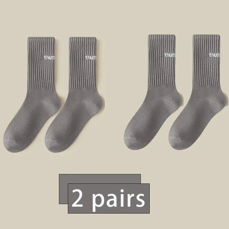 2 pairs of new mid length socks for men in spring, summer, autumn, and winter, sweat breathable sports high tube trendy socks