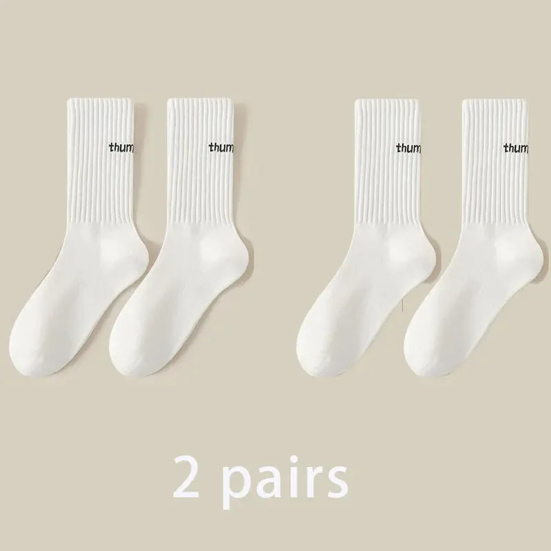 2 pairs of new mid length socks for men in spring, summer, autumn, and winter, sweat breathable sports high tube trendy socks
