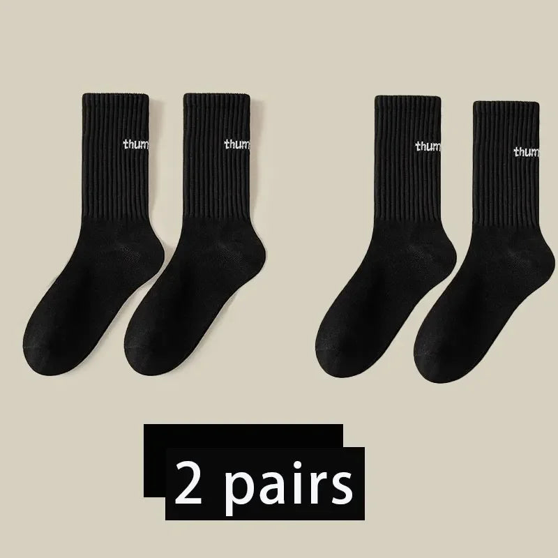 2 pairs of new mid length socks for men in spring, summer, autumn, and winter, sweat breathable sports high tube trendy socks