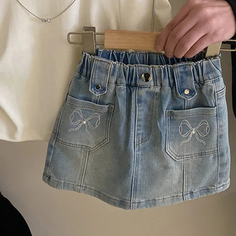 Children T-shirtTide Childrens Clothing New Girl Design Sense T-shirt Tops Versatile Bow Knot Cowboy Short Skirt 2024 Round Collar