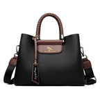 Elegant Women's Handbag Unique Handle Design Featuring a Stylish Pattern Spacious Interior  Adjustable Strap Functionality
