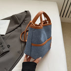 Women handbags. Early autumn senior commuter niche mobile phone slung bag girl 2025 new retro brown bucket bag small handbag